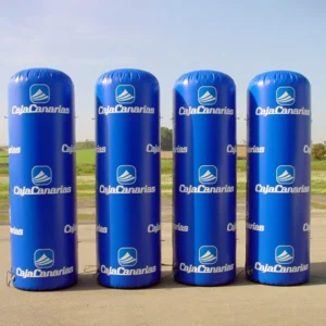 Four blue inflatable pillars with repeated printed branding
