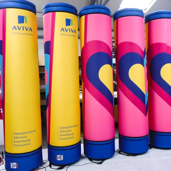 Yellow and pink AVIVA branded inflatable columns with blue bases
