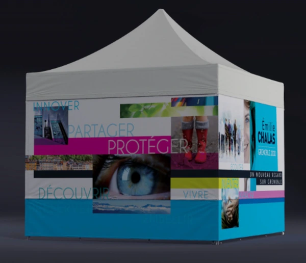 White canopy tent enclosed with colorful printed panels showing eye-care themed artwork