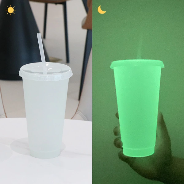 Side-by-side comparison of a white straw tumbler in daylight and glowing green in darkness