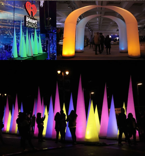 Nighttime collage showing an illuminated inflatable arch and colored cone displays