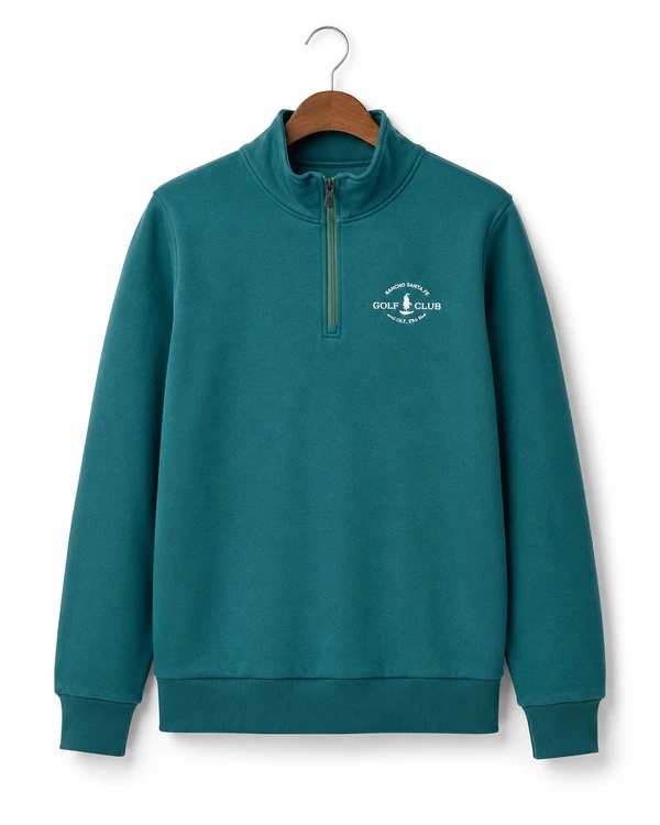 Teal quarter zip sweatshirt on a hanger with a small white chest logo